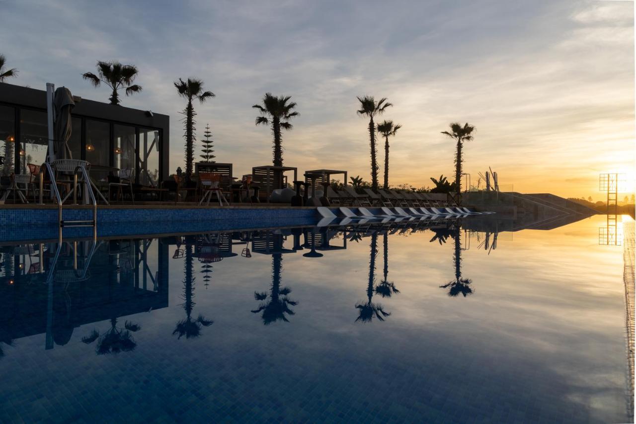 Pullman Mazagan Royal Golf & Spa El Yadida Exterior foto Sunset at the pool